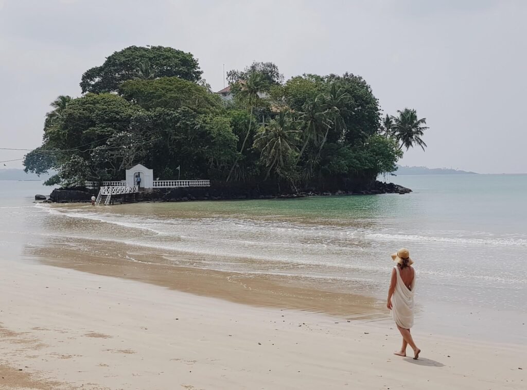 woman-in-a-dress-walking-on-the-beach-alone-2026-01-09-01-08-50-utc