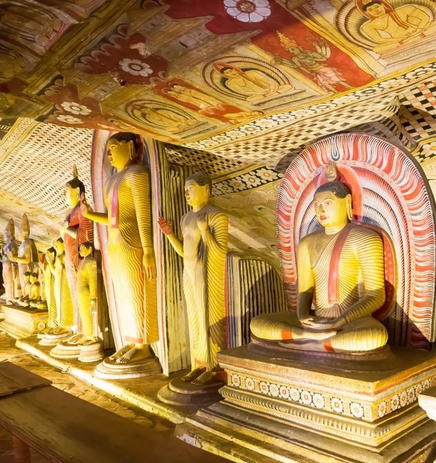 Ancient golden statues in buddha temple on Ceylon. Sri Lanka, Unesco heritage. Asia culture, bubbhism religion