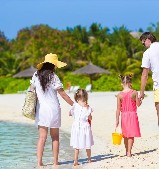 happy-beautiful-family-on-a-tropical-beach-holiday-2026-01-08-00-26-56-utc