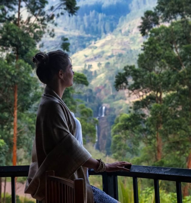 silhouette-woman-traveler-relaxing-on-balcony-at-m-2026-01-08-23-22-36-utc